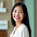Portrait of an organized wellness program coordinator, Emily Chen.